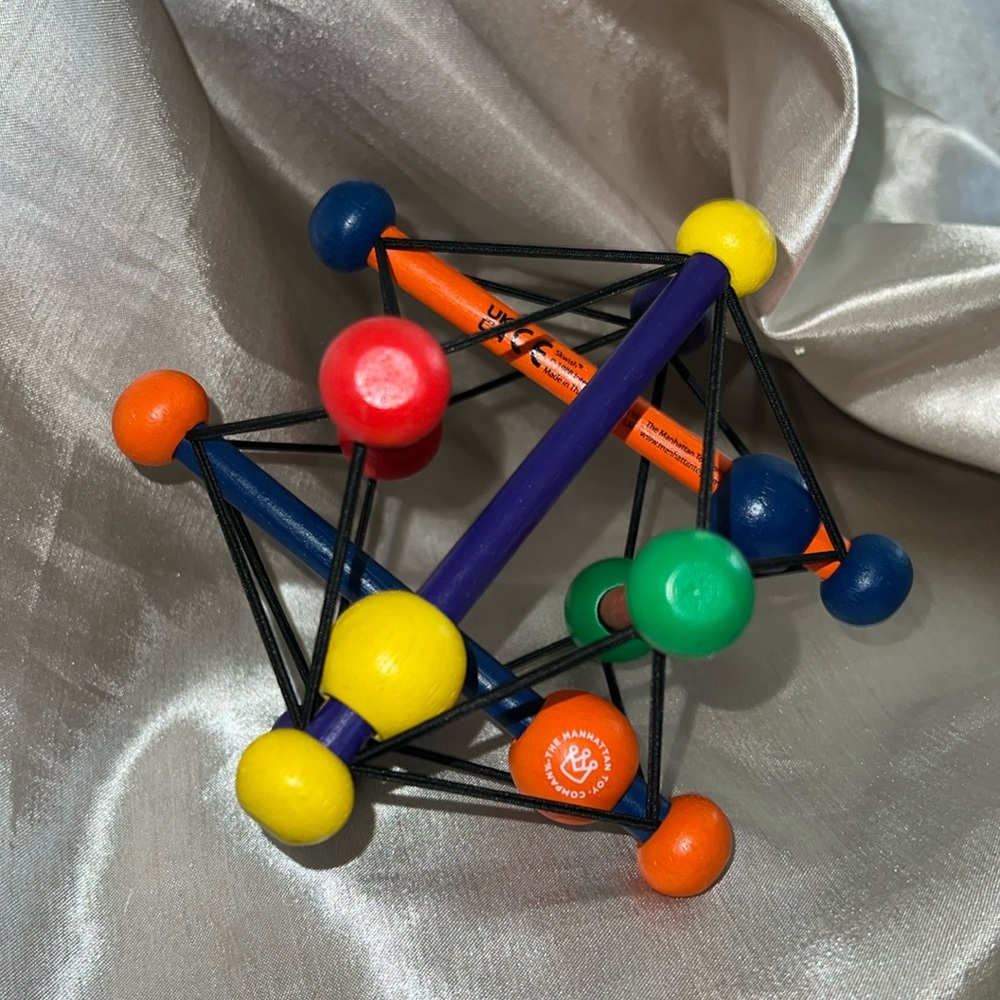 Manhattan Toy Co. Skwish Classic Rattle and Teether Grasping Activity Toy